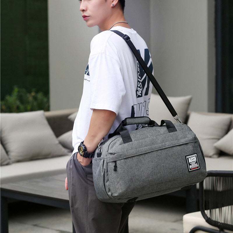 A short one-shoulder bag shoulder bag mass hand travel luggage deng ji bao gym bag package to be produced