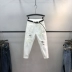 Hàng châu Âu trắng chín điểm quần harem nữ 2020 mùa hè nóng khoan lỗ graffiti căng là quần jeans mỏng thường thủy triều - Quần jean Quần jean