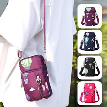 New Wanxiang Neng mobile phone bag female messenger bag halter neck wrist coin purse mobile phone bag portable vertical mini bag