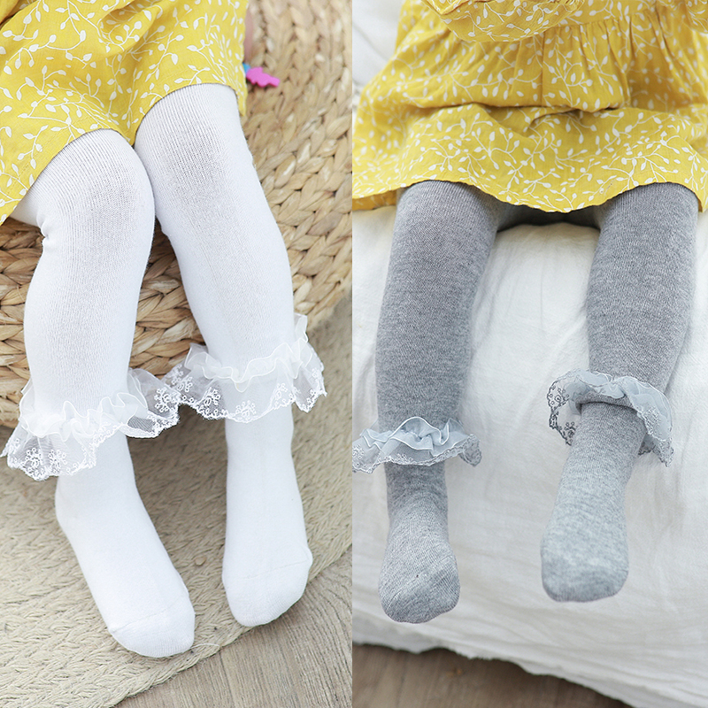 Cô gái mùa xuân và mùa thu lớn pp pantyhose baby baby chân vớ vớ trẻ em ren sàn tay áo 1-2-3 tuổi 5.