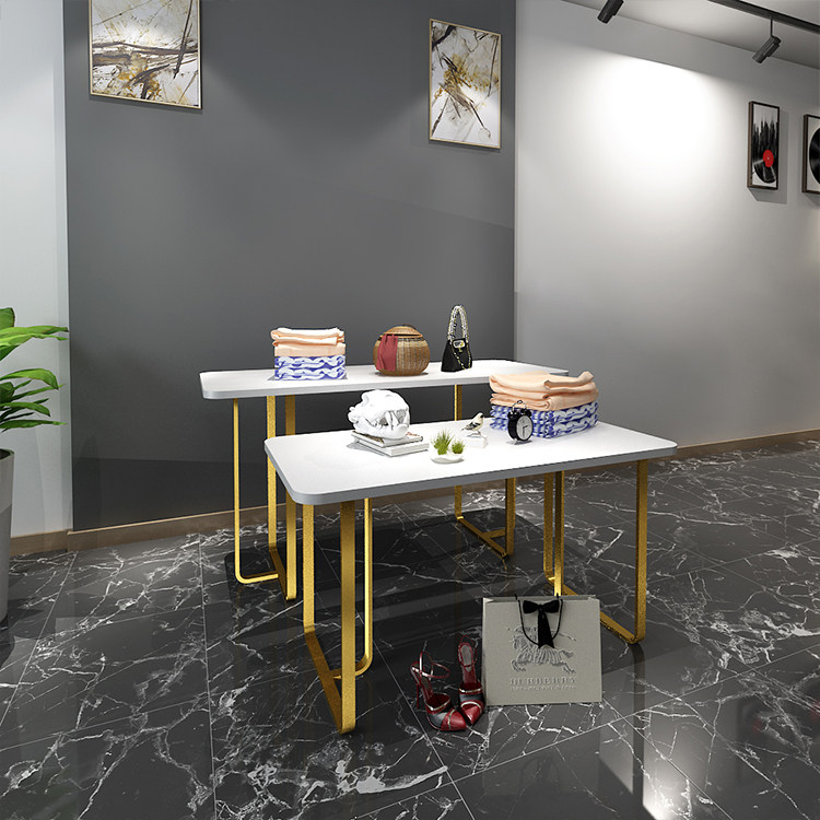 Golden flow table window clothing store Nakajima display table Women's store display rack high and low bag shelf Floor-to-ceiling