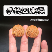 Boutique pairing of walnuts lions head four buildings mini small size little ladys hand twisting and playing with walnuts