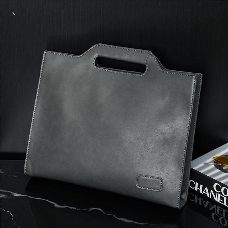 Hong Kong new leather business casual men's shoulder bag hand bag fashion Men's bag cross bag official