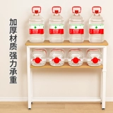 Шкаф для хранения в задней части стойки для заднего хранения дивана находится рядом со стеной и кроватью края кровати. Шкаф для хранения у кровати находится за зазором кровати.