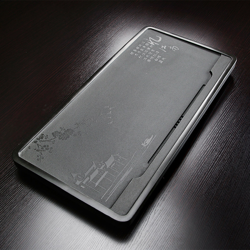 Natural Ujinshi tea tray home simple size whole piece of rough stone stone black gold stone tea sea stone tea table