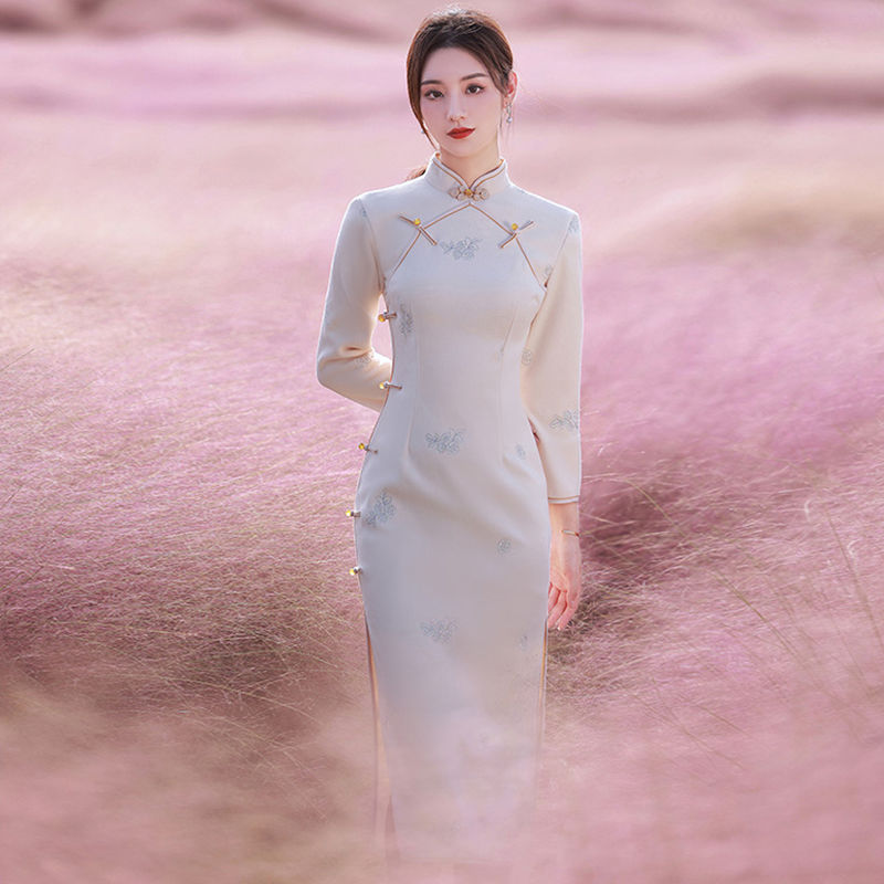Huaxie Li autumn and winter wool cheongsam 2021 new padded warm New Year short cotton-padded young girls long sleeve winter