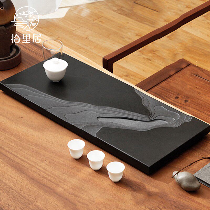 The natural whole piece of Wujin Stone tea tray Japanese simple rectangular dry bubble marble tea table Tea Sea
