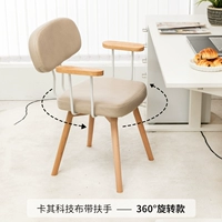 Ткань цвета хаки, подлокотники, ножки из массива дерева, поворотные.