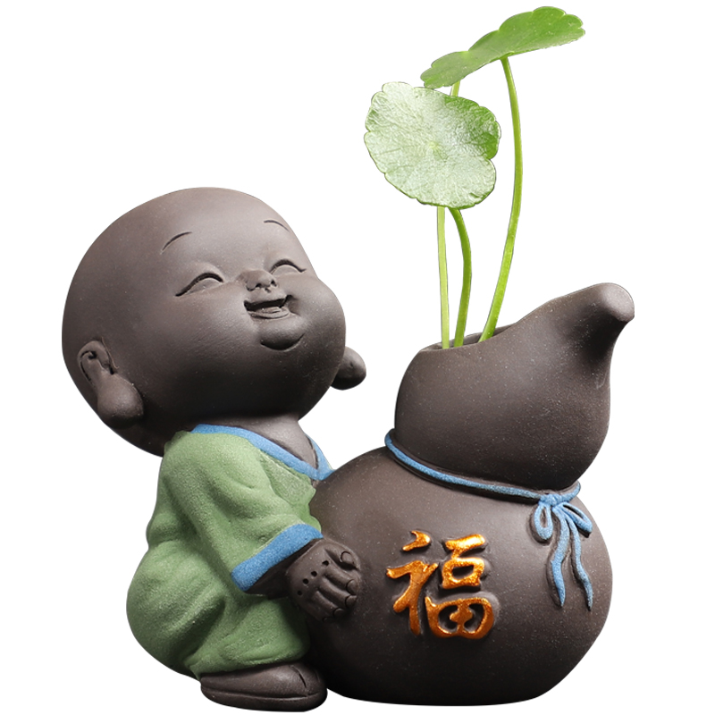 一壶茶香里的禅意伙伴：紫砂小和尚茶宠摆件