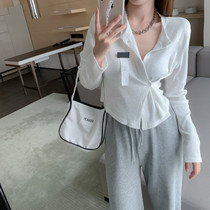 Irregular short long-sleeved t-shirt womens 2021 new design sense of niche slimming chic Western-style sweet and spicy top