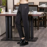 Демисезонные черные трикотажные эластичные рабочие штаны подходит для мужчин и женщин для отдыха