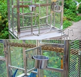 Клетка для птиц с птичьей клеткой из нержавеющей стали.