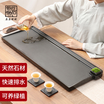 Stone stone carved natural black gold stone tea tray Household drainage New Chinese tea table Simple large small stone tea set