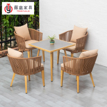 Nordic outdoor table and chair garden courtyard leisure balcony rattan chair modern designer Villa rock board dining chair five-piece set