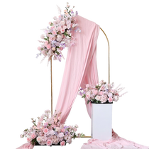 Pink floral arrangement wedding welcome area fake flowers ceremony background simulated flowers wall-hanging flowers floor-to-ceiling flowers.