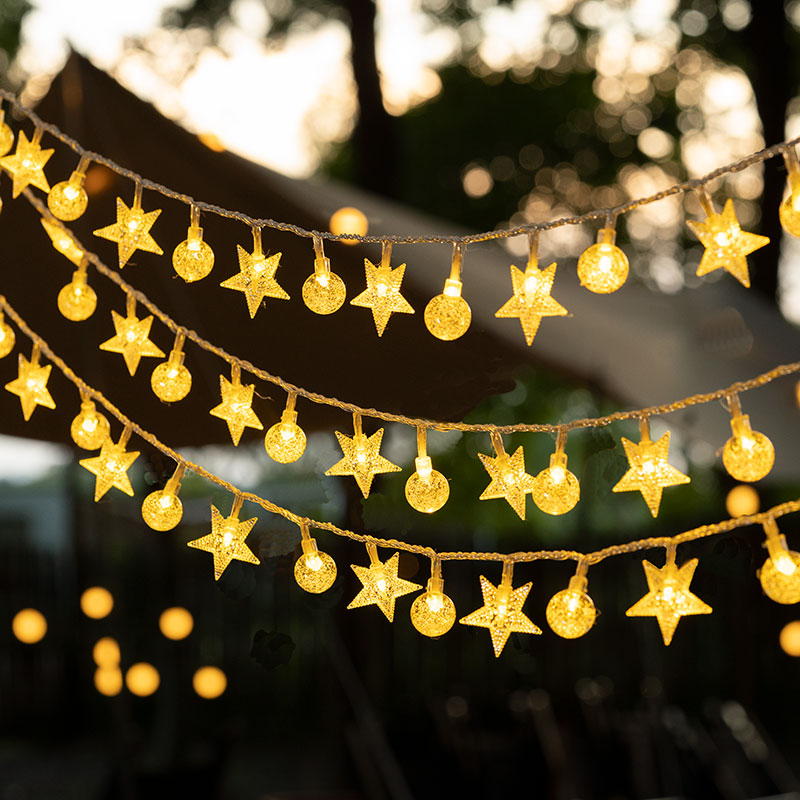 Colorful changing lanterns in rural yard