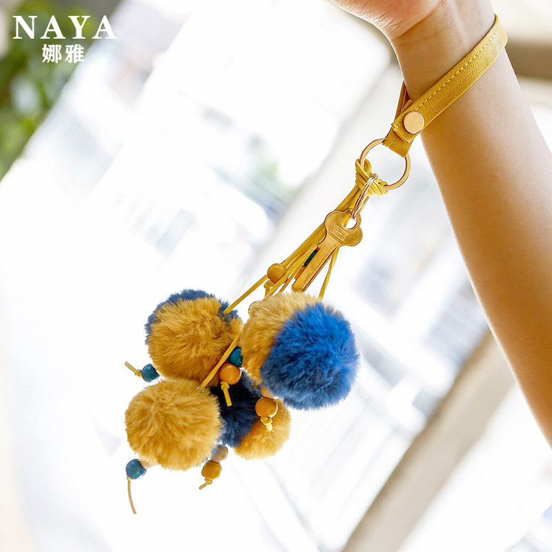 Wrist keychain female original 2020 leather snap key bracelet Korean version color wood bead hair ball bag pendant