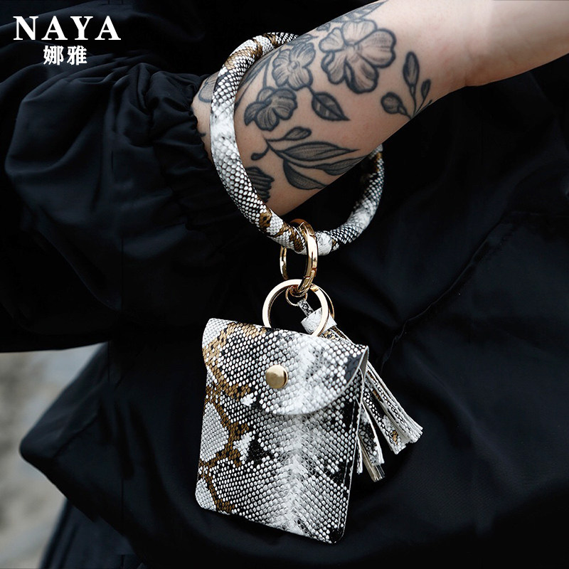 Wild snake pattern pendant girl personality wrist coin card bag European and American pu leather diy multi-functional key ring ring