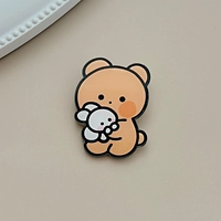 Держа кроличьего медведя (кофе)