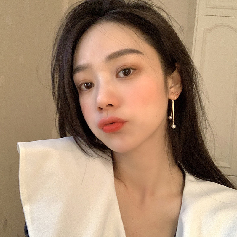 Pearl tassel earrings long Korean temperament Internet celebrity fashion premium bow stud earrings female simple cold wind