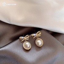 Korean pearl earrings female retro high sense 2021 New Tide light luxury temperament sterling silver bow earrings