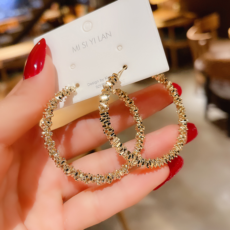 European and American exaggerated metal lukewarm wind large earrings small crowddesign feeling ring earrings Earrings Personality 100 lap pure silver needle earrings