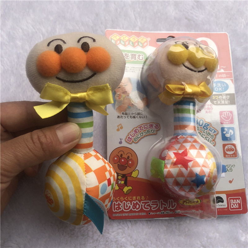 Japanese baby grabbing stick Bread Superman color puppet hand ringing bell to appease early education toys 0-1 years old