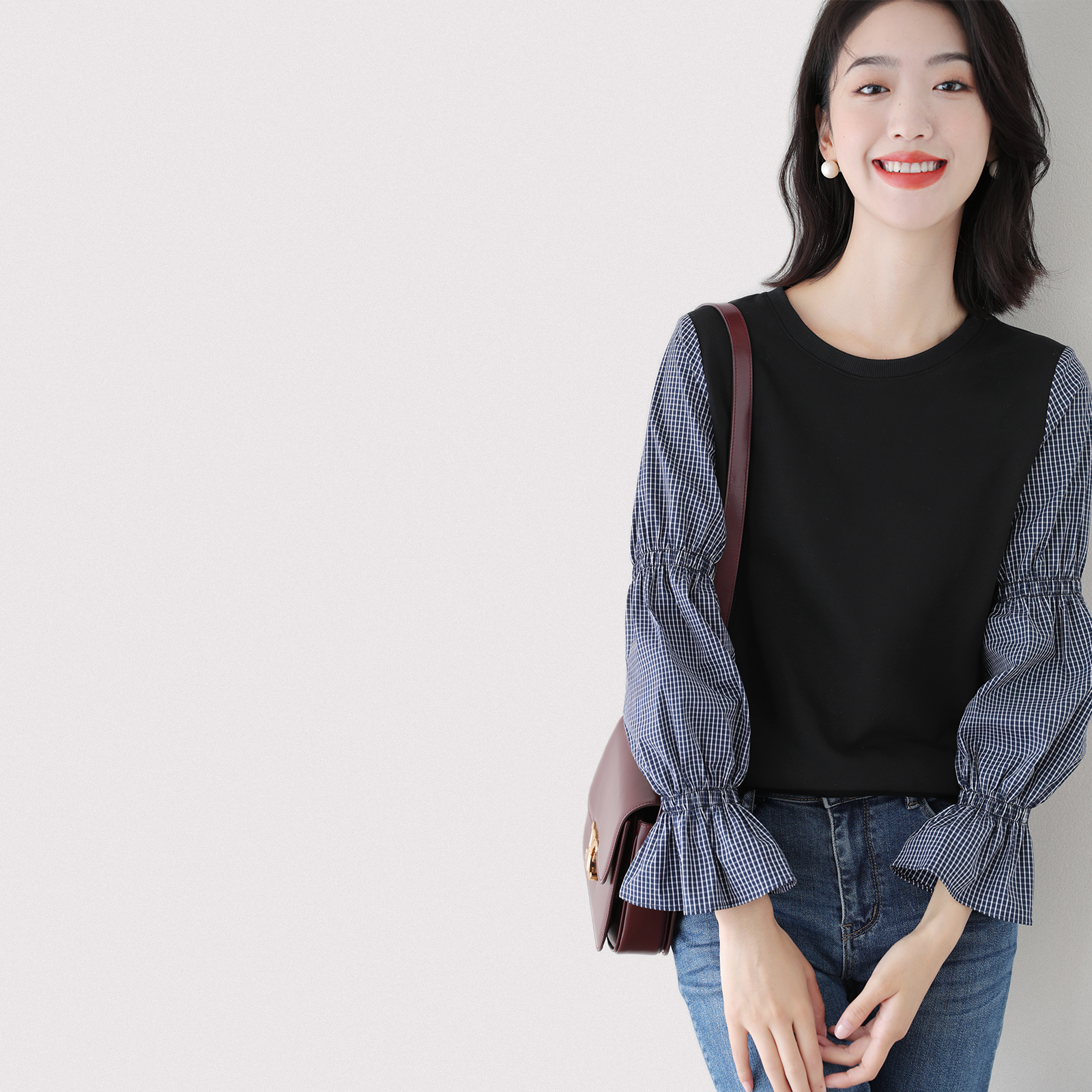 Plaid stitching fake two-piece sweater women's spring and autumn thin section 2021 new high-end long-sleeved design niche