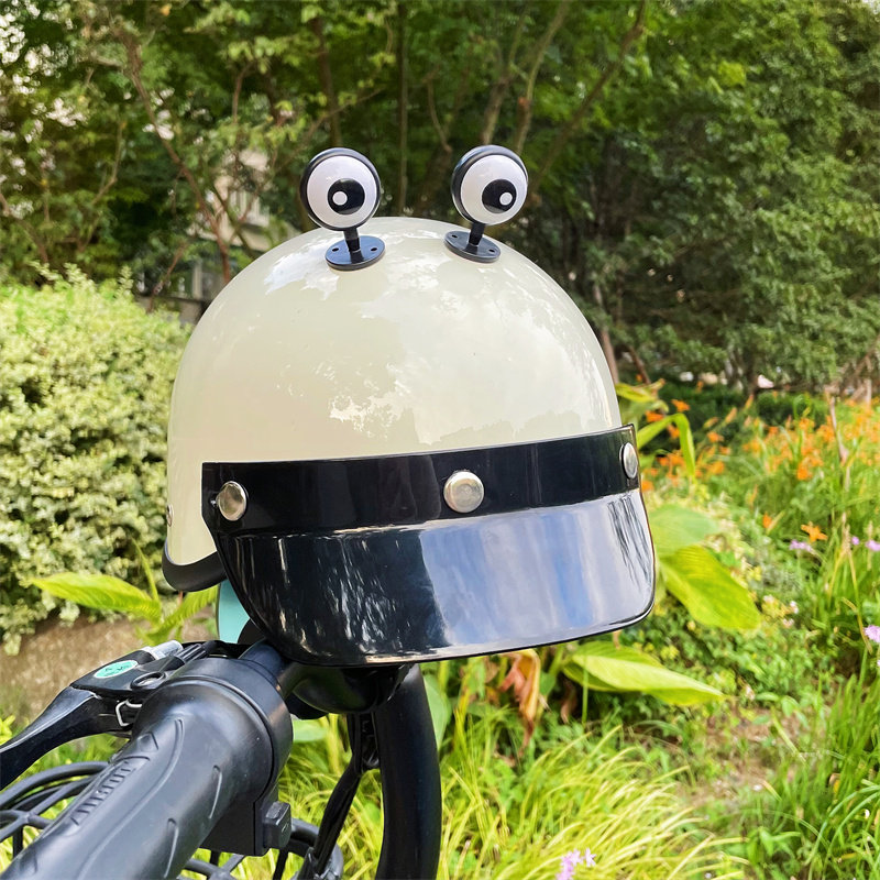 Eye battery electric car motorcycle helmet decoration small accessories pendant decoration doll doll bicycle