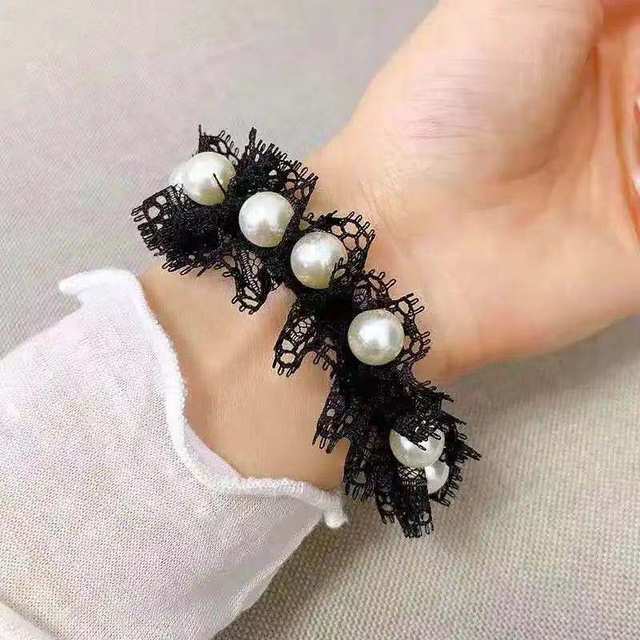 Korean nail pearl seamless black bow hair rope lace hair band rubber band fashionable ງ່າຍດາຍຜູ້ໃຫຍ່ແລະເດັກນ້ອຍ tie