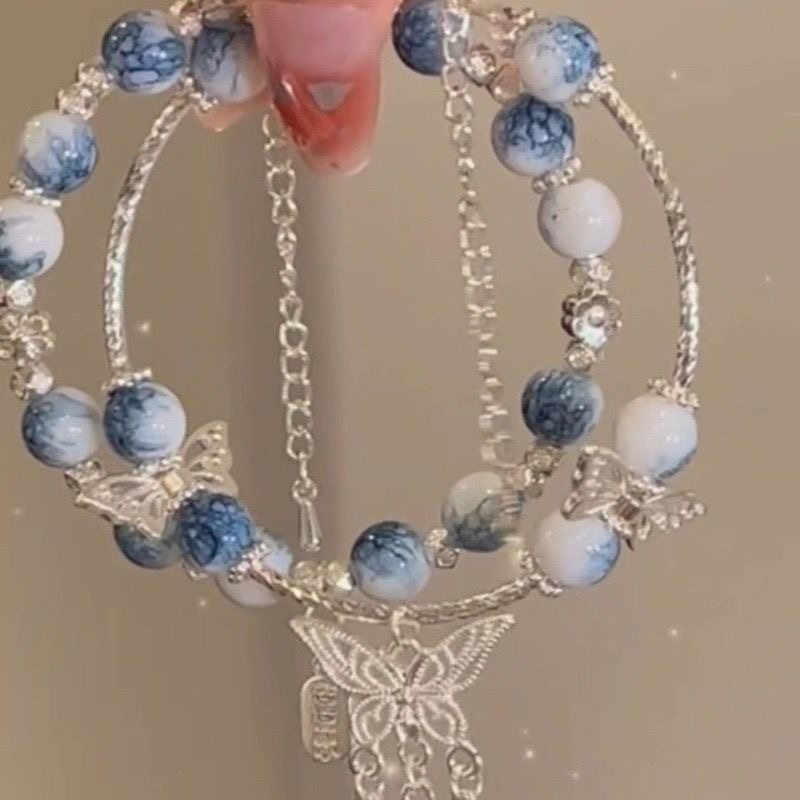 Xiaohongshu Blue and White Porcelain Color Scheme Ancient Style Butterfly Tassel Bracelet for Women Niche Design Chinese Style Peace and Fortune Pendant