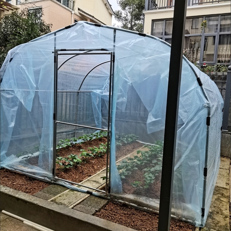 Simple Arch-Shaped Greenhouse for Home Use, Suitable for Winterizing Green Plants in Small Gardens, Sunlight Flower Room, and Flower Seedling Cultivation, with Light Transmission and Thermal Insulation Simple Arch-Shaped Greenhouse for Home Use, Suitable for Winterizing Green Plants in Small Gardens, Sunlight Flower Room, and Flower Seedling Cultivation, with Light Transmission and Thermal Insulation