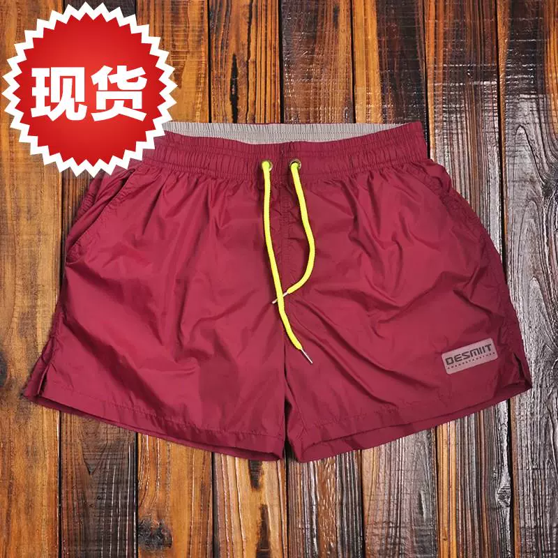 Quần đi biển nhanh khô quần đi biển thể dục thể thao nam quần đùi ba điểm có lót, quần short bơi suối nước nóng ở khu nghỉ mát bên bờ biển - Quần bãi biển