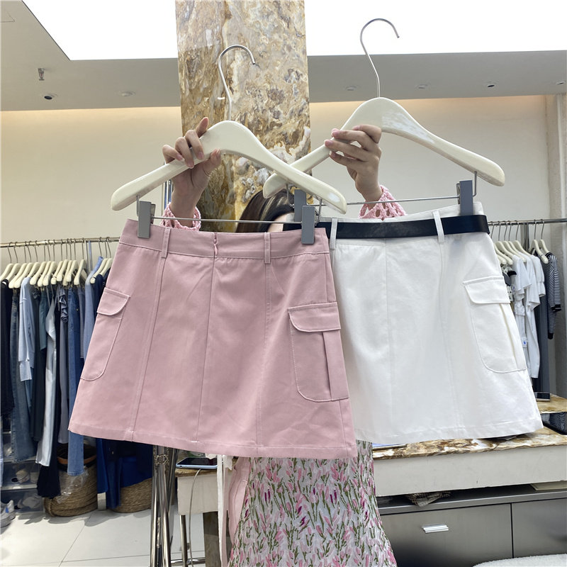 AK Korean version 2022 summer new high waist thin solid color design sense pocket tooling skirt bag hip short skirt tide