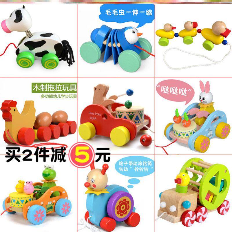 Children pulling toy car baby toddler baby pulling rope pulling hand pulling dog animal pulling wire pulling car kindergarten