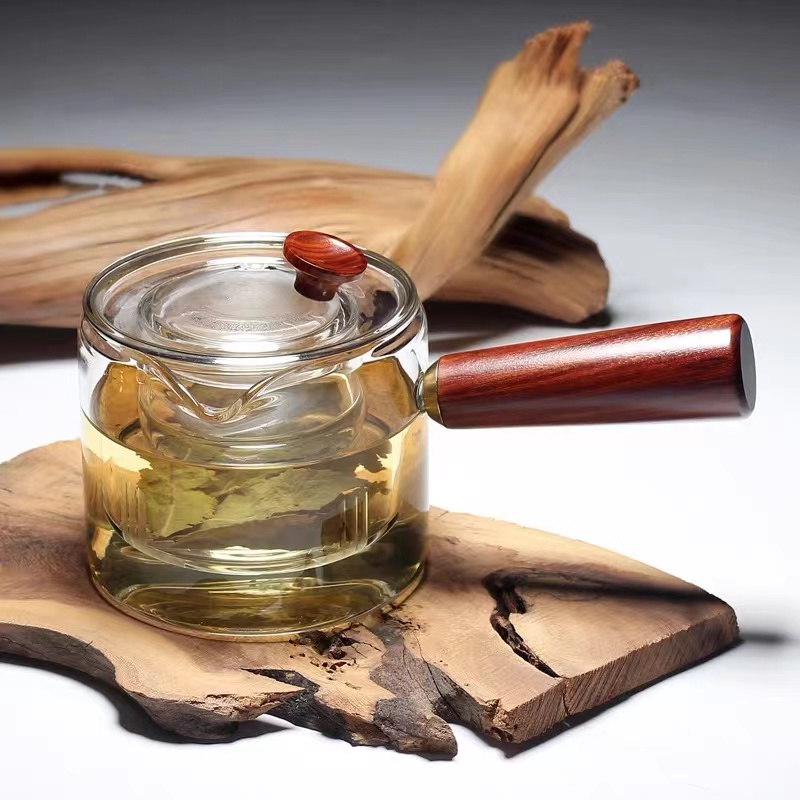 Japanese-style wooden handle Xinyu glass teapot resistant to high temperature and thickened side handle pot black crystal furnace tea maker with strainer kettle