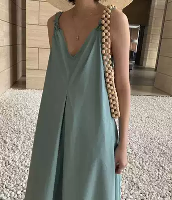 South Korea 2021 summer V-neck suspender dress female Korean loose French niche design holiday long skirt