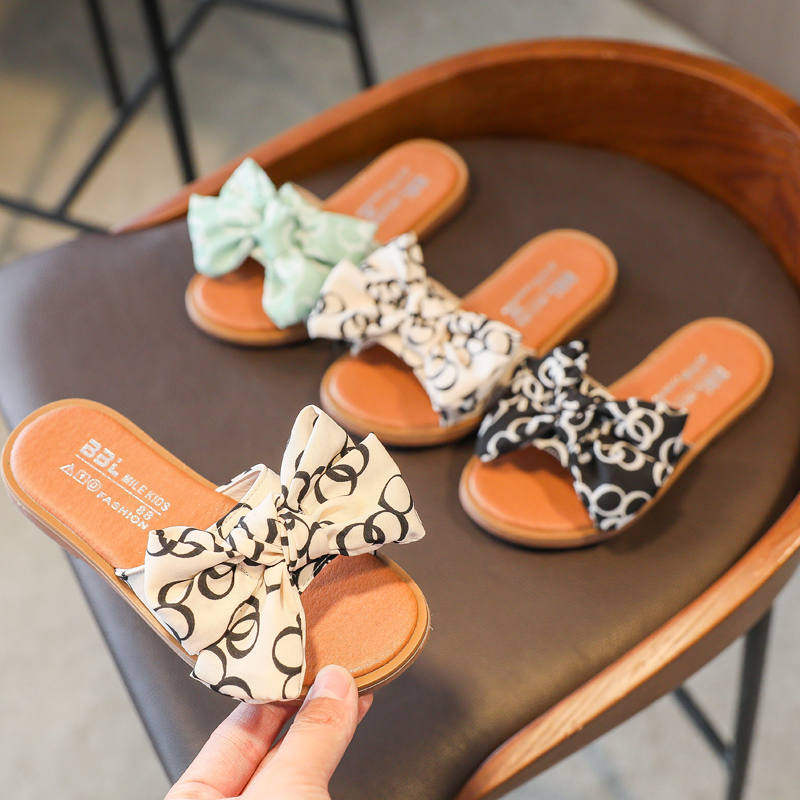 Children slippers female 2021 Summer new butterfly knot outside wearing girl princess girl little girl Soft bottom word slippers