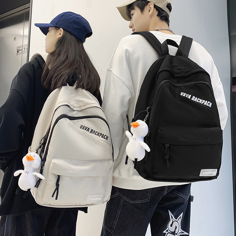Junior high school boy Han version Trend High School college student large capacity Shoulder Bag 100 Hitch Couple Computer Rear Shoulder Bag Woman