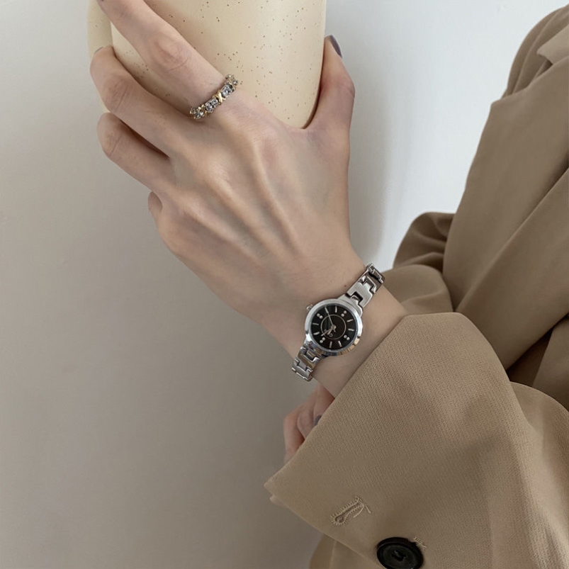 Watch female advanced feeling cold wind student simple waterproof female watch temperament Joker retro hand watch female niche