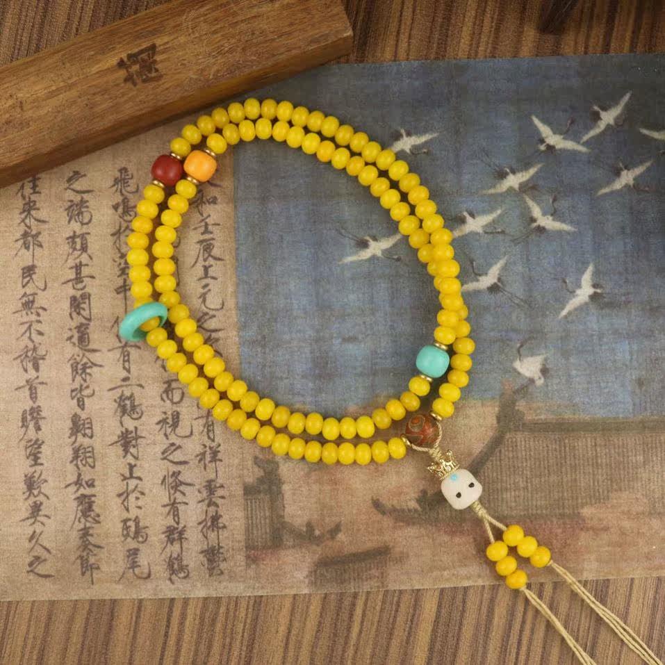 The yellow jade Bodhisattva of the Buddha's neck is 108 protective majoring in the hand strings of male and female money chain ornaments