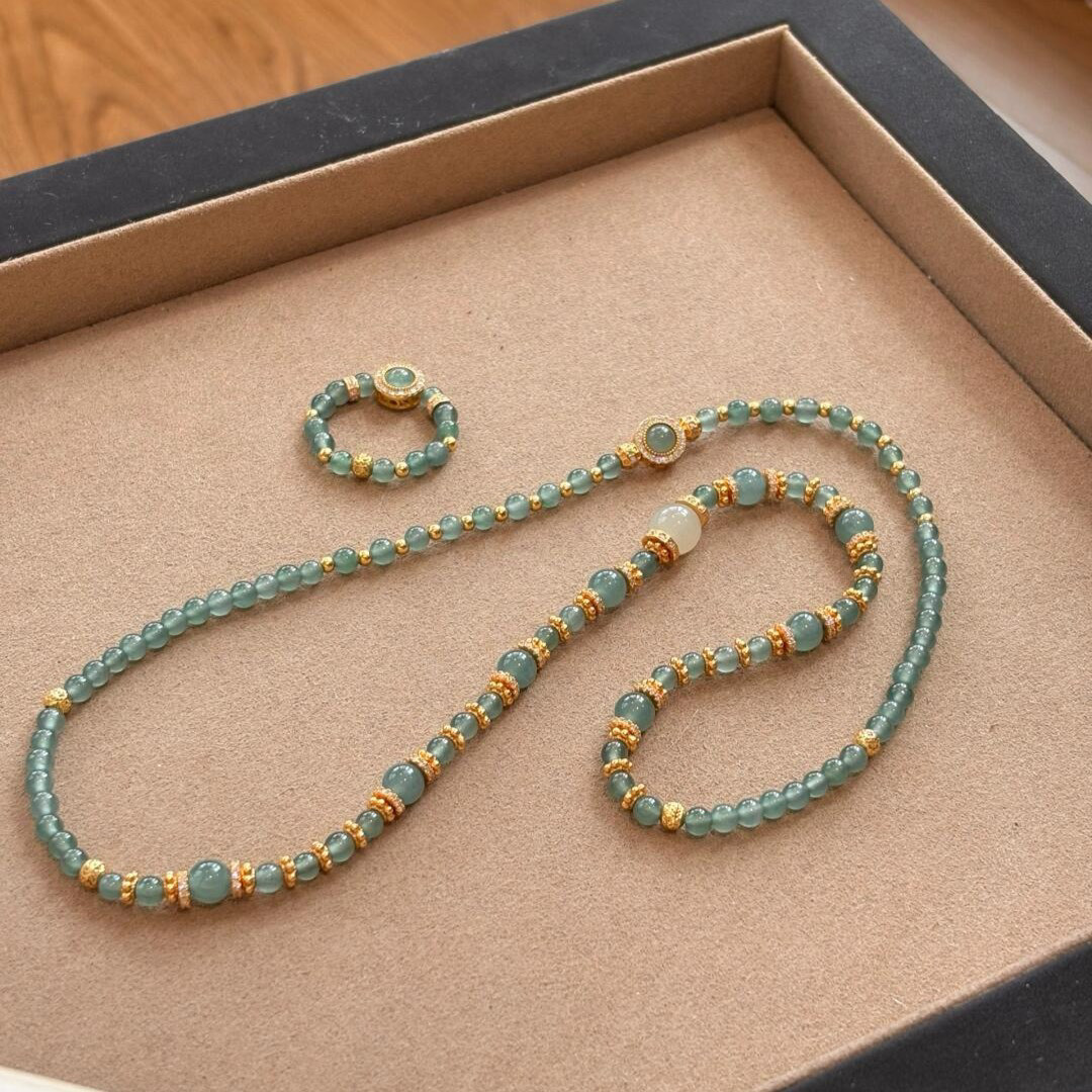 Natural ice permeable dangerous material blue water jade millet bead necklace multi-circle bracelet ring set sweater chain temperament versatile