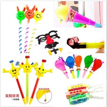 Toy children toy with mouth blown with a smile on the face and blow the whistle on the creative whistleblowing toy birthday party booing.