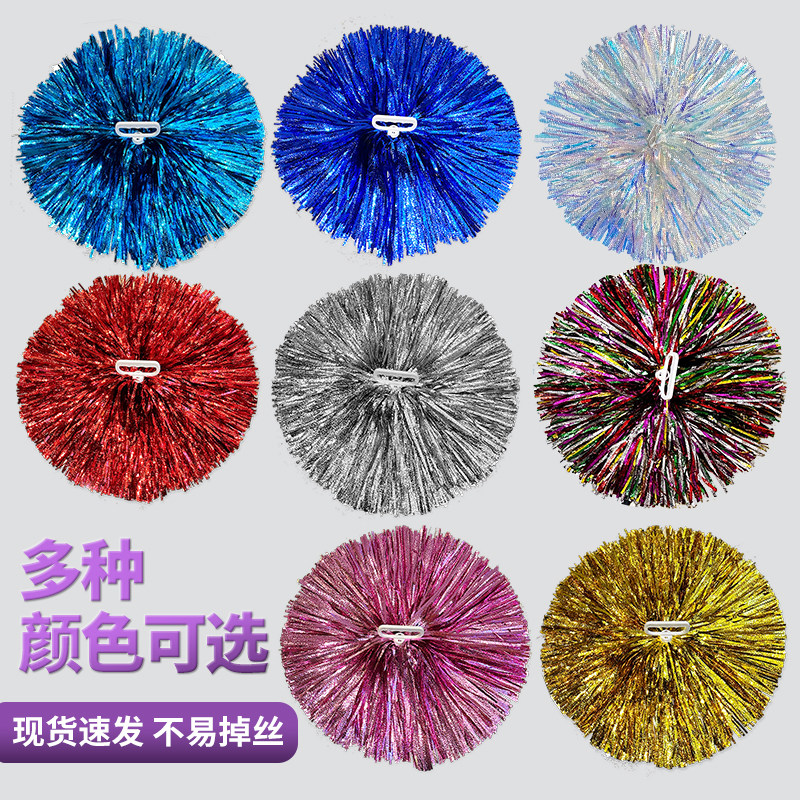 チアリーディングのハンドフラワー、チアリーディングのポンポン、カラフルなポンポン、チアリーディングのスポーツ大会、手持ちの花、握手する花のパフォーマンス