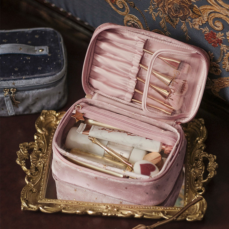 Makeup bag female portable network red super large capacity hand collection bag in air 2022 new advanced sensory travel