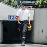 Четыре цвета рабочих брюк рабочие брюки, черные рабочие брюки.