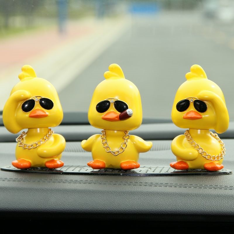 Little yellow duck car ornaments vibrato car net red social duck shaking his head doll car center console creative personality trend