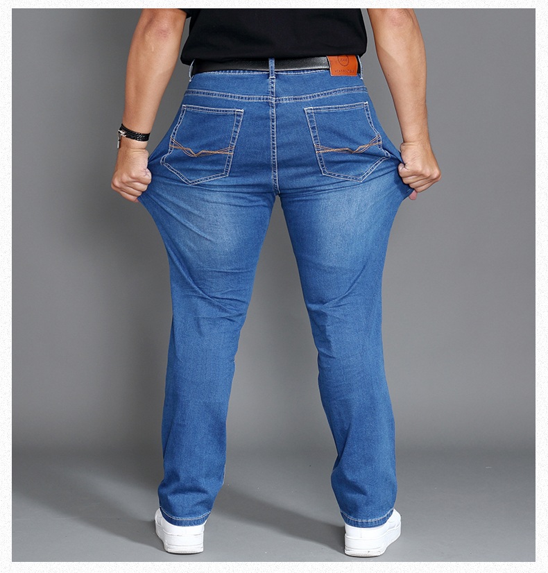 Chất béo mùa hè kích thước lớn jeans nam phần mỏng cộng với phân bón cộng với lớn chất béo lỏng đàn hồi thẳng kích thước lớn quần