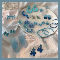 Earrings female summer gentle hao White ~ spring blue flower nail New 2021 bow temperament senior sense