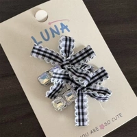 Черный клетчатый ромбовидный узел из одного слова